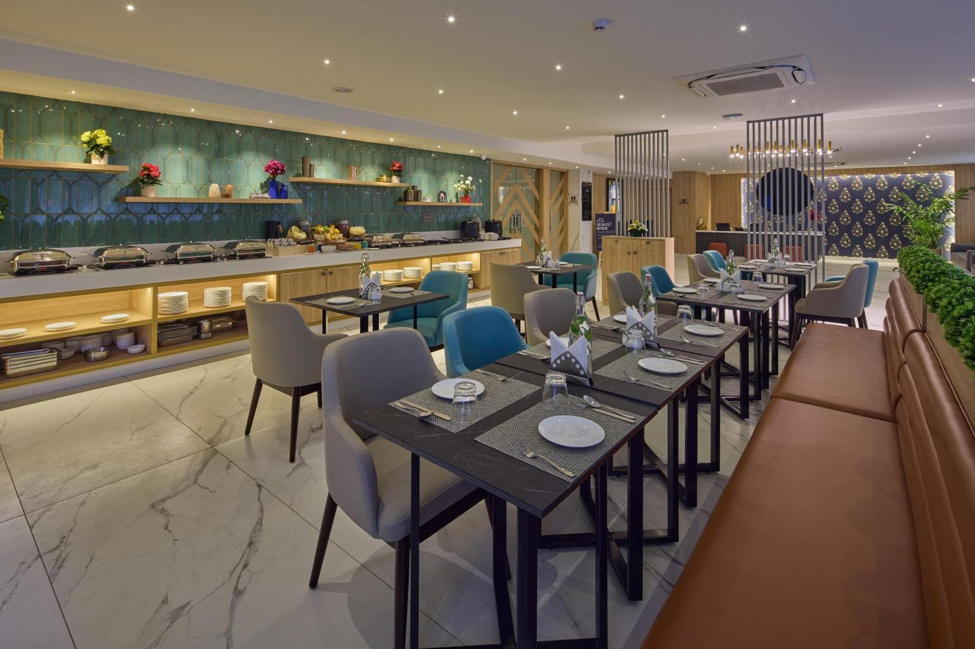 העיר בנגלור Grand Continent Hebbal A Sarovar Portico Affiliate Hotel מראה חיצוני תמונה