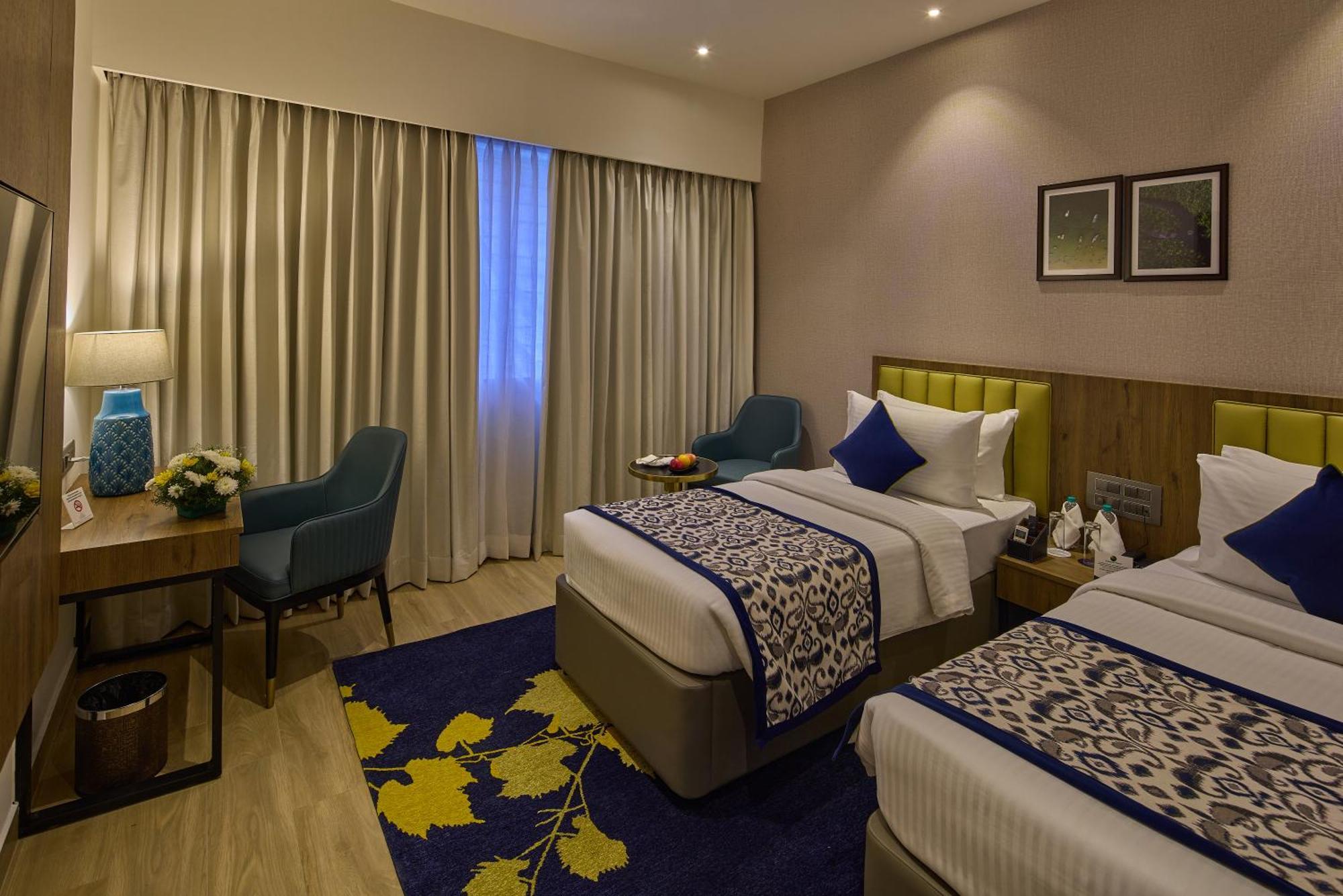 העיר בנגלור Grand Continent Hebbal A Sarovar Portico Affiliate Hotel מראה חיצוני תמונה