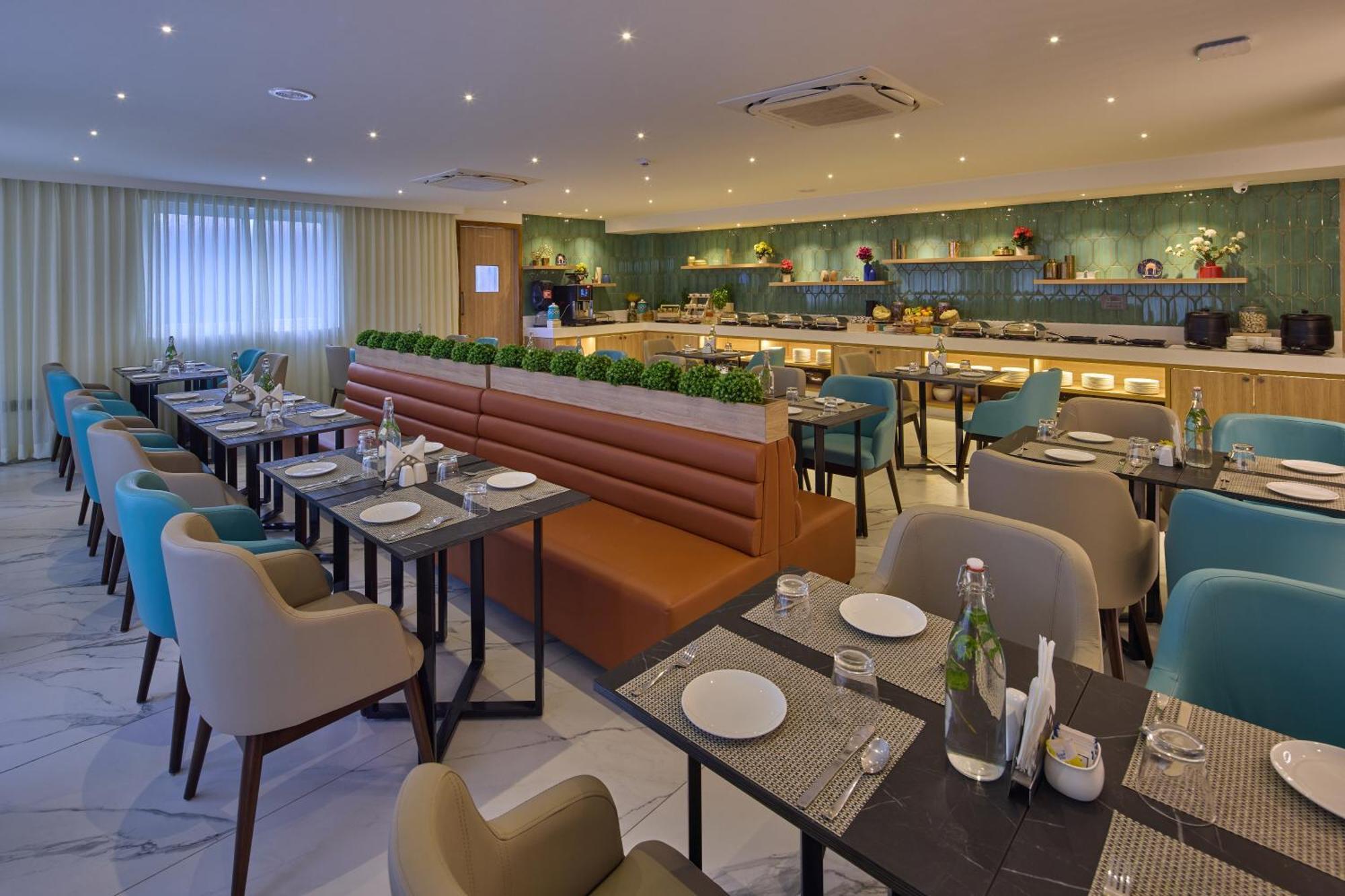העיר בנגלור Grand Continent Hebbal A Sarovar Portico Affiliate Hotel מראה חיצוני תמונה