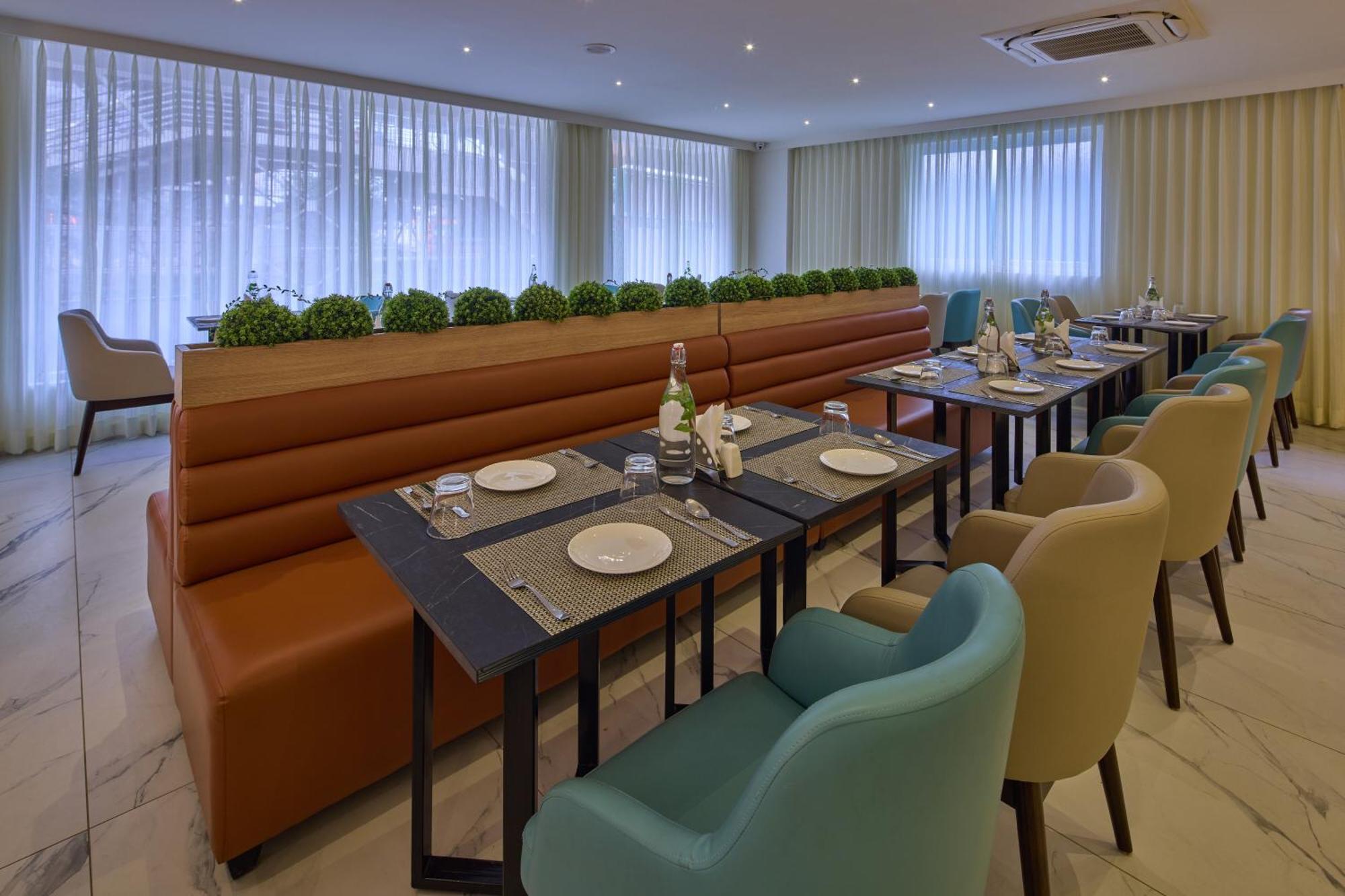 העיר בנגלור Grand Continent Hebbal A Sarovar Portico Affiliate Hotel מראה חיצוני תמונה